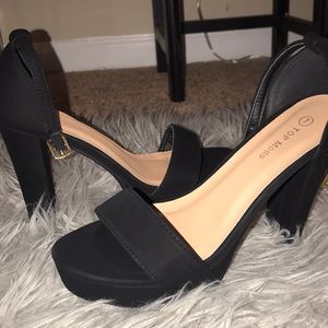 Black heels (never worn)